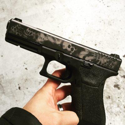 Laser engraved Typhon style camo on a Glock slide