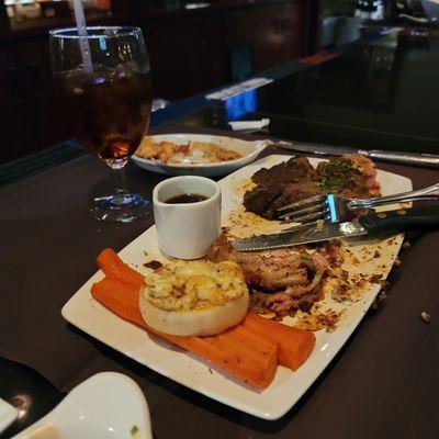 What is left of my husband's queen prime rib blackened with the bacon blue cheese on the side :)