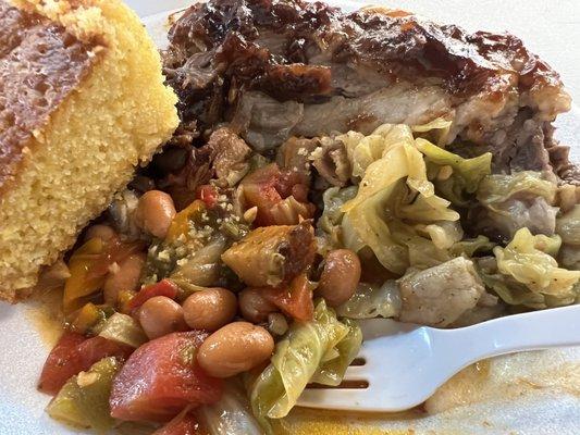 Bbq pork ribs, fried cabbage, special beans and corned bread.