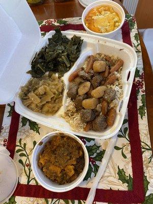 Beef stew over rice with cabbage, Collard greens, yams and Mac & Cheese