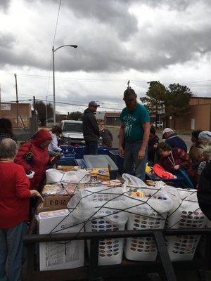 1200 pounds of food , 600 each of blankets , hats , scarves , t-shirts , pairs of socks , gloves and 100 coats.