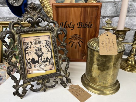 Antique metal picture frame and brass urn.