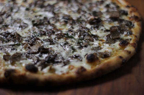 White mushroom: White pie with mushrooms, fontina, black pepper, and truffle