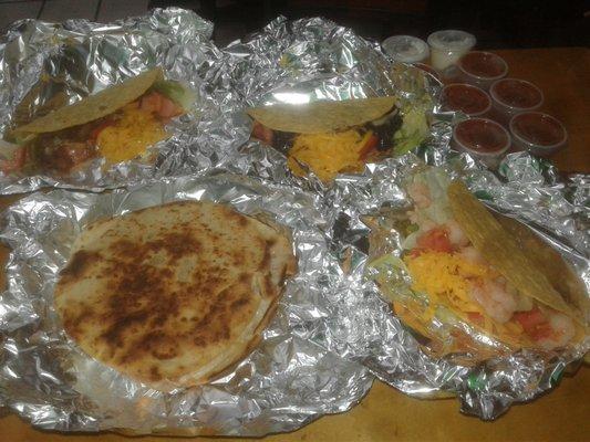 Quesadilla with cheese and pico de gallo along with 2 bean tacos and 1 shrimp taco