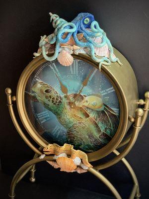 Unique home accents can be found in the gallery like this hand sculpted octopus clock.