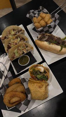 Al Pastor Tacos, Philly Cheesesteak, Chicken Wrap