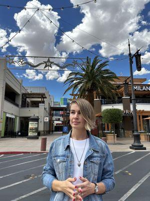 Tatiana in town Square looking around at your next commercial property!