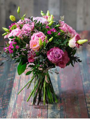 Pretty in Pink wedding bouquet perfect for a mountain wedding !  Garden roses, freesia and lisianthus make this bouquet fragrant & unique!