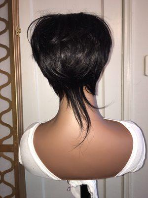 Back view of Luxe traditional wig unit pixie cut