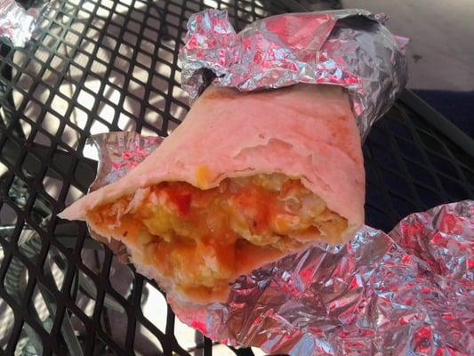 A delicious breakfast burrito that melts in your mouth.