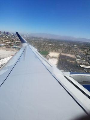 Flying above McCarran Marketplace which is below center right.