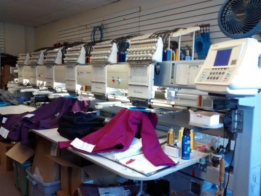 The 6-head embroidery machine running at full speed.