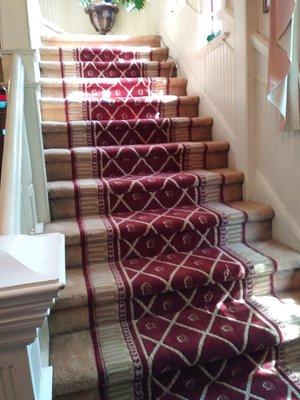 Stair runner installed on stairs.