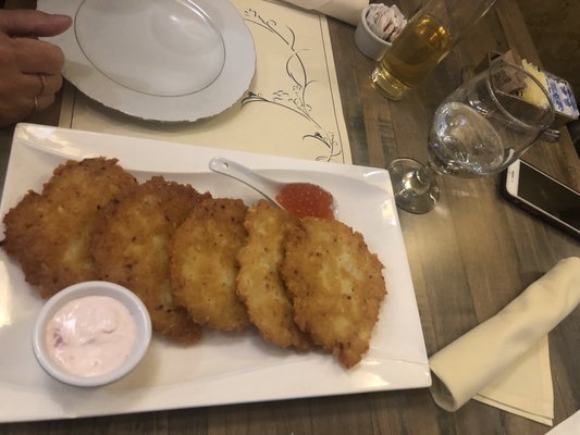 Potato pancakes with salmon paste and caviar