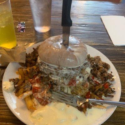 "The Gang" Burger!! What a delicious burger!! It's the size of at least two large burgers, fries, and white cheese sauce.