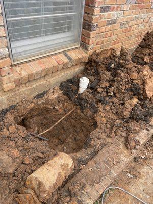 Utility line discovered while excavating.