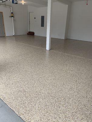 Beautiful copper mountain flake epoxy garage floor in Windsor, CO