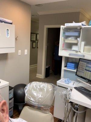 Dental chair and station entrance.