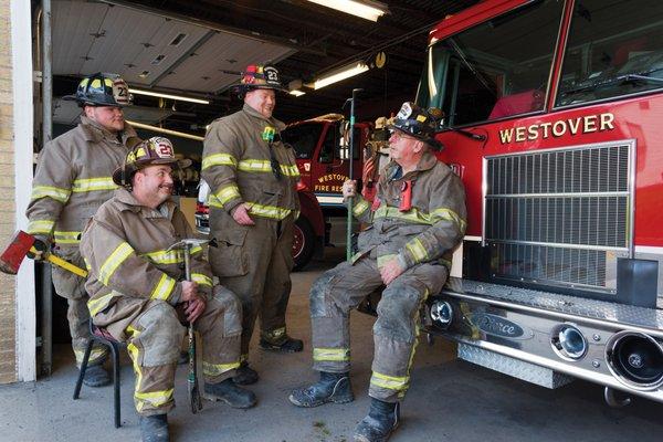 Westover Volunteer Fire Department firemen Josh Smith, Eugene Harris, Brian Rehwinkel, and Chief Kenny Goodwin hang out at the firehouse on