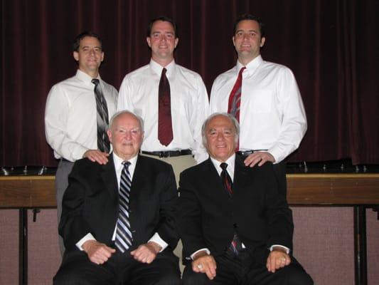 (left to right): Adam Poole, D.C., Aaron Poole, M.D., Eric Poole D.C., (bottom row) Leland Poole, D.C., Dennis Poole, D.C.