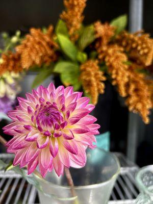 Local flowers in the cooler for sale at The Flower Basket