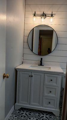 Did floor tile wall light fixture vanity mirror plumbing