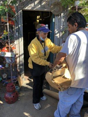 This is Ms. Delia and one of her employees, helping pack up some pieces.