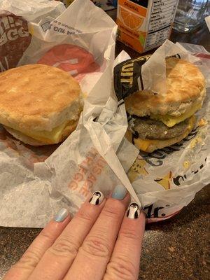 McDonald's egg and cheese on a semi fresh biscuit vs Carl's Jr. Hard, greasy biscuit with sausage (not what I ordered).