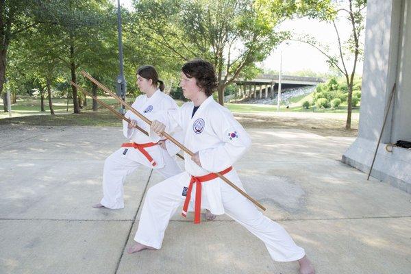 Two of my earliest students wielding the staff.