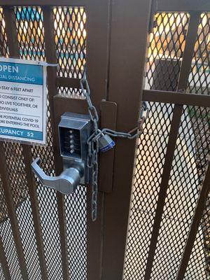 Locks on gates over a year to keep outsiders out and local people.