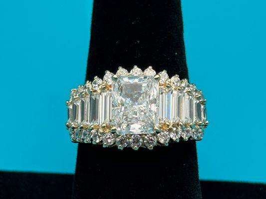 Ladies multi facet Cubic Zirconia ring set in 14K gold.  Beautiful!