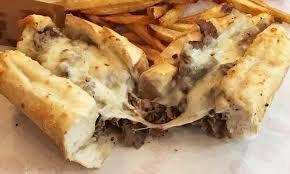 Cheesy Beef..Vienna Beef topped with Mozz Cheese, Bun Dipped or Dry with Hot or Sweet Peppers