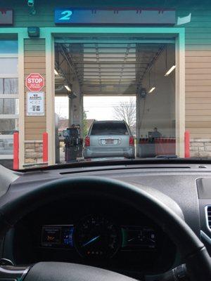 Waiting in line to pull forward for an oil change