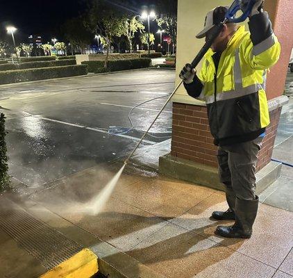 Shopping center pressure washing maintenance.