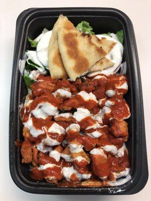 Chicken over rice (medium heat), salad and pita bread.