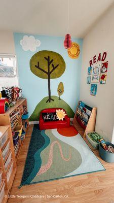 The cozy reading nook at our daycare.