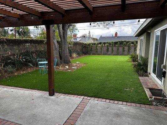 Wood Patio Cover, Artificial Turf, Planting, Landscape Lighting & Mulching By Lush Gardens, Inc. in Sherman Oaks CA