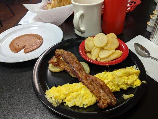 Breakfast platter! Home fries, bacon, eggs and bologna.