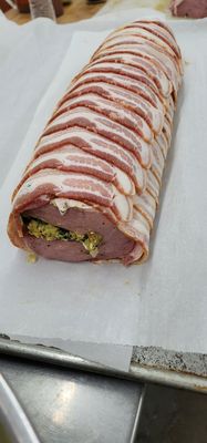 Bacon wrapped stuffed pork loin with spinach,feta, granny smith apples, Buffalo mozzarella