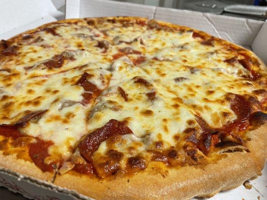 Thick crust sausage and pepperoni pizza