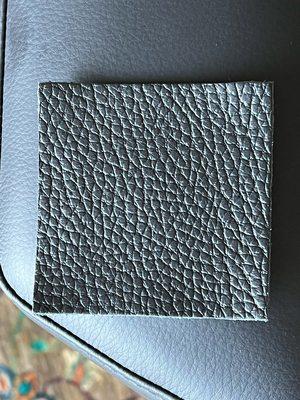 Sample of the leather we chose, compared to what was delivered.