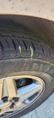 Marked hole in tire by shop employee.