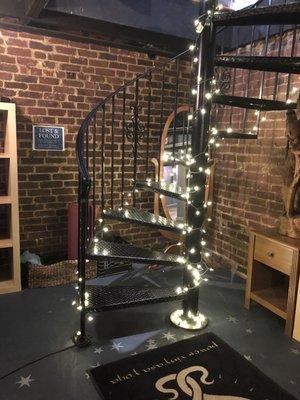 Sparkling lights decorating the stairs from the changing area.