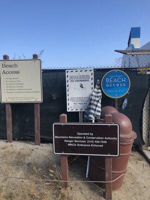 Signage at the entrance of the beach staircase