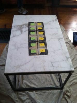 Custom patio table with marble top .