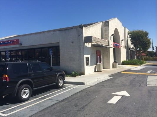 There's a front and the back entrance to the building. And bullet proof glass protecting the tellers.