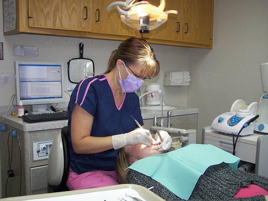 Dr. Guthrie working with patient