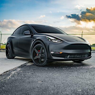 Tesla Model Y wrapped in satin black 3M 2080 film