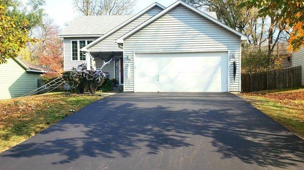 Brand new blacktop driveway! So smooth and clean! Great job by Blacktop Pros!