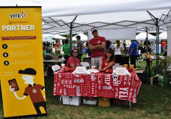 Yelp Booth. Stop by next year for fun & games, swag, & to meet your Friends or make new ones. L-R:Volunteers Heidi S, Alexander T, & Sarah P